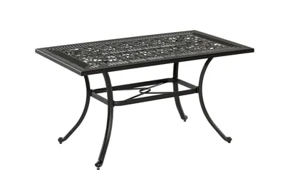 A black metal rectangular outdoor dining table with an ornate, patterned tabletop and curved legs, shown against a white background.
