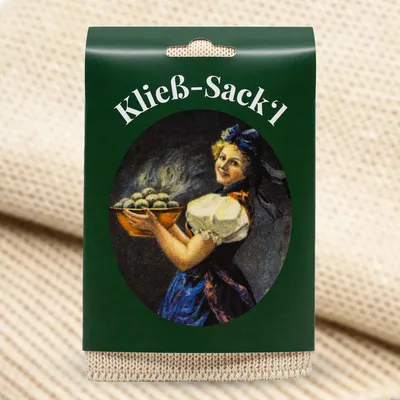 A product package for 'Kloßsack original Grüne Klöße' featuring an illustration of a woman holding a bowl of dumplings.