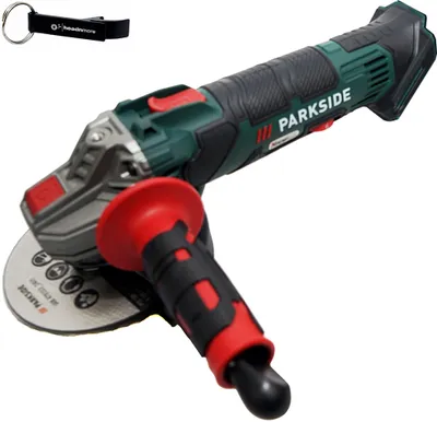 A cordless angle grinder with a side handle and a cutting disc, shown against a white background. A keychain is visible in the upper left corner.