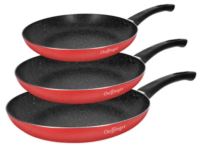 A stack of three red frying pans with black handles and speckled gray interiors, presented against a white background.