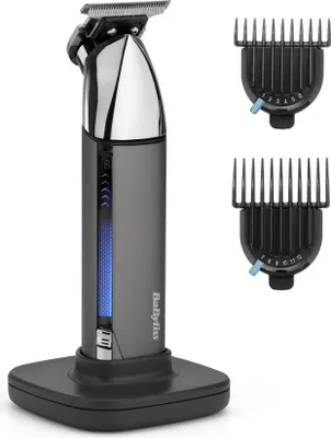 A cordless hair trimmer and its accessories are displayed on a white background.