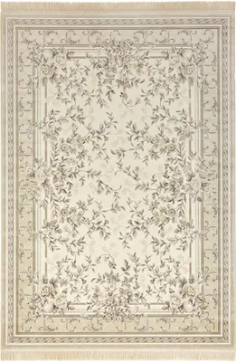A top-down view of a rectangular rug with a floral pattern.