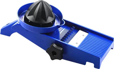 A blue and black vegetable slicer with a citrus juicer attachment.