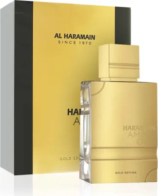 A perfume bottle and its packaging are displayed against a white background.