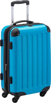 A studio shot of a blue suitcase on a white background.