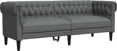 A dark gray, three-seater sofa with tufted back cushions and rolled arms, shown from the front on a white background.