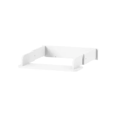 A white baby changing station attachment for a dresser, shown from a slightly elevated side angle against a white background.