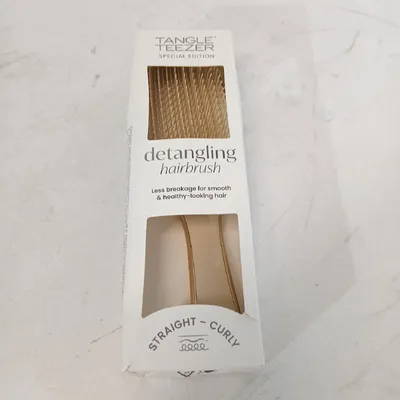 Immagine prodotto di Spazzola Ultimate Detangler per lisci e ricci Chrome Neo Gold