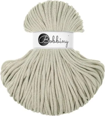 A ball of beige cord on a white background.