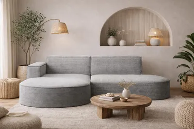 A modern living room with a sectional sofa, coffee table, and floor lamp.