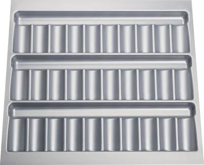 A close-up, top-down view of a metal multi-compartment tray, likely for organizing tools or small items.