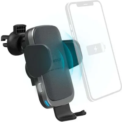 A wireless car phone charger with a phone being charged.