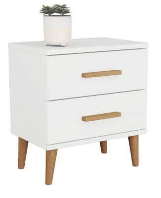 A white nightstand with wooden legs and drawer pulls, topped with a small potted plant.