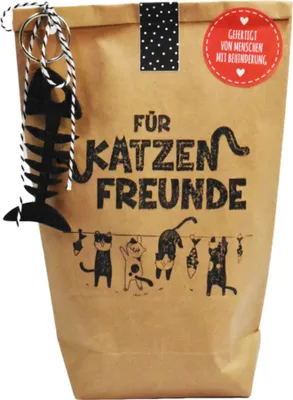 A brown paper bag with cat-themed decorations and text.