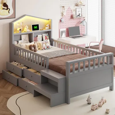 A child's bedroom with a bed and desk.