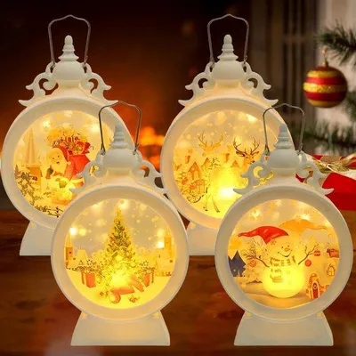 Produktbild von Unyqoos® Set aus vier atmosphärischen Weihnachtslaternen mit warmem LED-Licht für den Innen- und Außenbereich