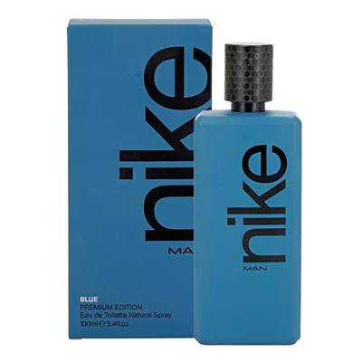 A blue bottle of Nike Blue Man Eau de Toilette and its matching blue box are displayed against a white background.