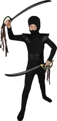 A child wearing a ninja costume and holding two swords.