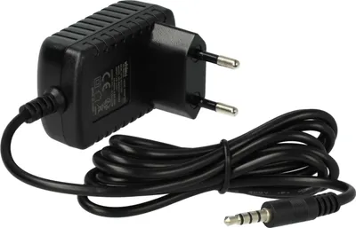 A black power adapter with a coiled black cable and a 3.5mm audio jack connector.