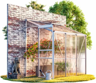 A greenhouse attached to a brick wall, with plants and a watering can.