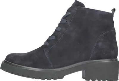 A side view of a dark blue suede boot with laces.