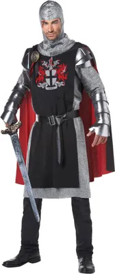 A man wearing a medieval knight costume, holding a sword.