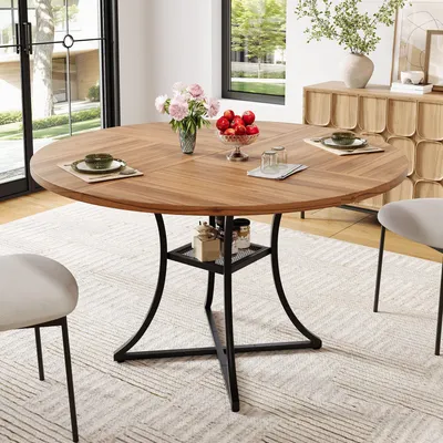 Imagen del producto de Mesa redonda de comedor Merax de 100 cm de diámetro, para 4-6 personas, con superficie de almacenamiento, estructura en forma de "X", tablero de MDF y acabado en color nogal. Ideal para cocina o comedor