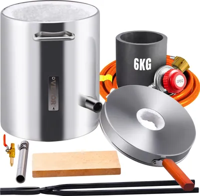 A collection of metal casting equipment laid out on a white background.