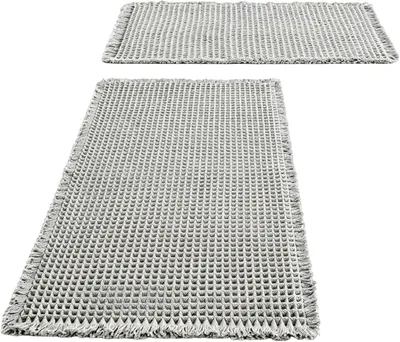 Imagen del producto de Juego de alfombras antideslizantes, de 2 piezas, con dimensiones de 46 x 77 cm y 43 x 24 cm, color gris claro, ideal para el baño