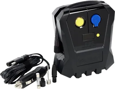 A black portable air compressor with accessories on a white background.