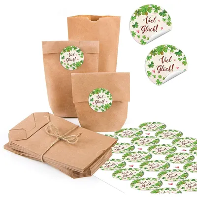 Produktbild von Kraftpapiertüten mit Boden 9 x 15 x 3,5 cm mit Aufklebern „Viel Glück“ Kleeblatt und HerzenGrün