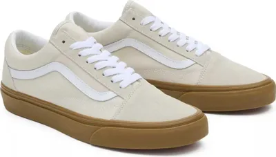 A pair of Vans Old Skool sneakers on a white background.
