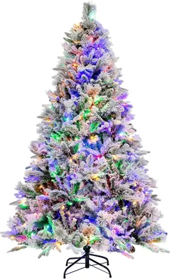A flocked artificial Christmas tree with multi-colored lights.