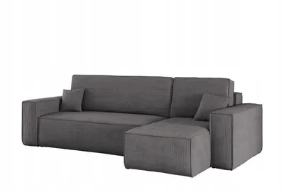 A gray sectional sofa with an ottoman.