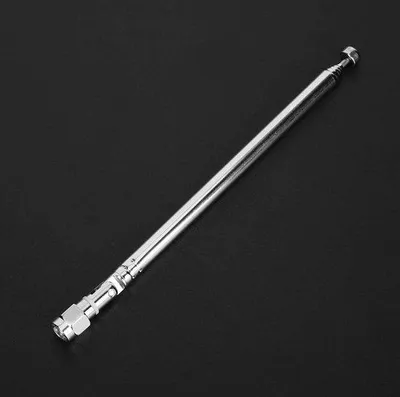 Imagen del producto de Antena telescópica de aluminio con conectores SMA y una base de 2 cm. Rango de frecuencia: 40 MHz - 6 GHz. Sistema VHF/UHF inalámbrico