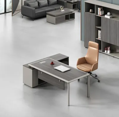 Zdjęcie produktu dla Kompaktowe szare biurko narożne 100x50x50 cm o nowoczesnym designie.