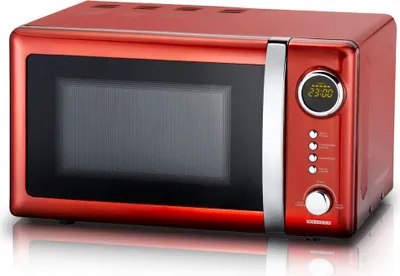 A studio shot of a red retro-style microwave oven with a digital display and control buttons.