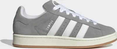 A side view of a gray Adidas Campus 00s sneaker with white stripes and laces, set against a white background.
