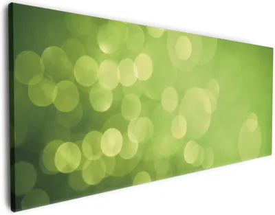 Produktbild von Wallario Premium Leinwandbild Abstrakte grüne Kreise  grüne Lichtpunkte in Größe 50 x 125 cm