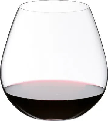 A clear studio shot of a wine glass with red wine.