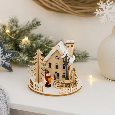 Produktbild von Weihnachtshaus LED beleuchtet mit Schlittenjunge