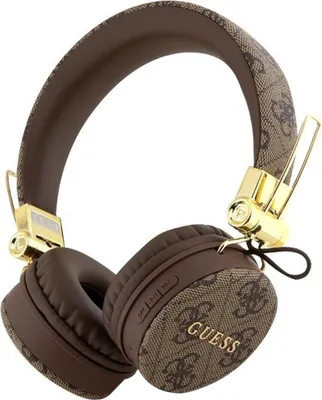 A pair of brown and gold Guess headphones with a monogram pattern.