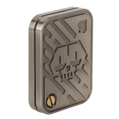 A metal poker push slider toy with a skull design.