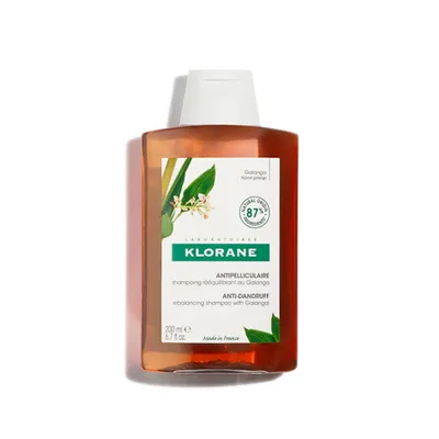 A bottle of Klorane shampoo with galanga extract.