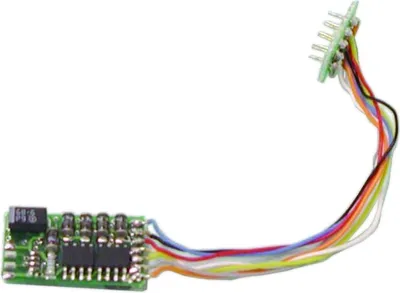 A close-up shot of a small electronic circuit board with multiple wires attached, against a white background.