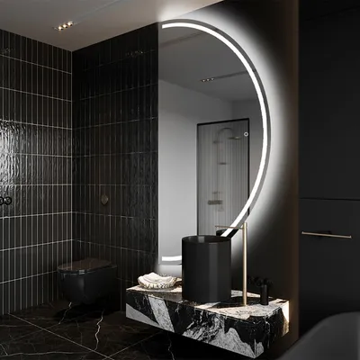 A modern, luxurious bathroom with black tiled walls, a black toilet, and a vanity with a black sink and marble countertop.