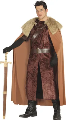 A man dressed in a medieval king costume, holding a sword.