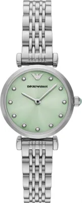 A close-up studio shot of a women's wristwatch.