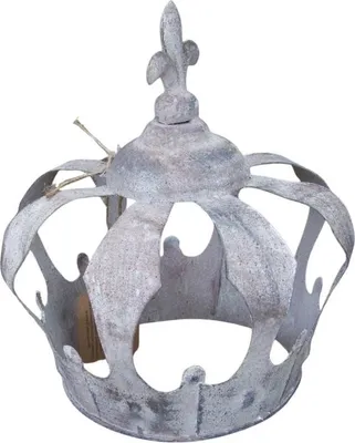 A close-up studio shot of a decorative metal crown.