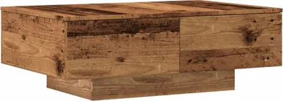 A wooden coffee table with a rustic, reclaimed wood appearance.